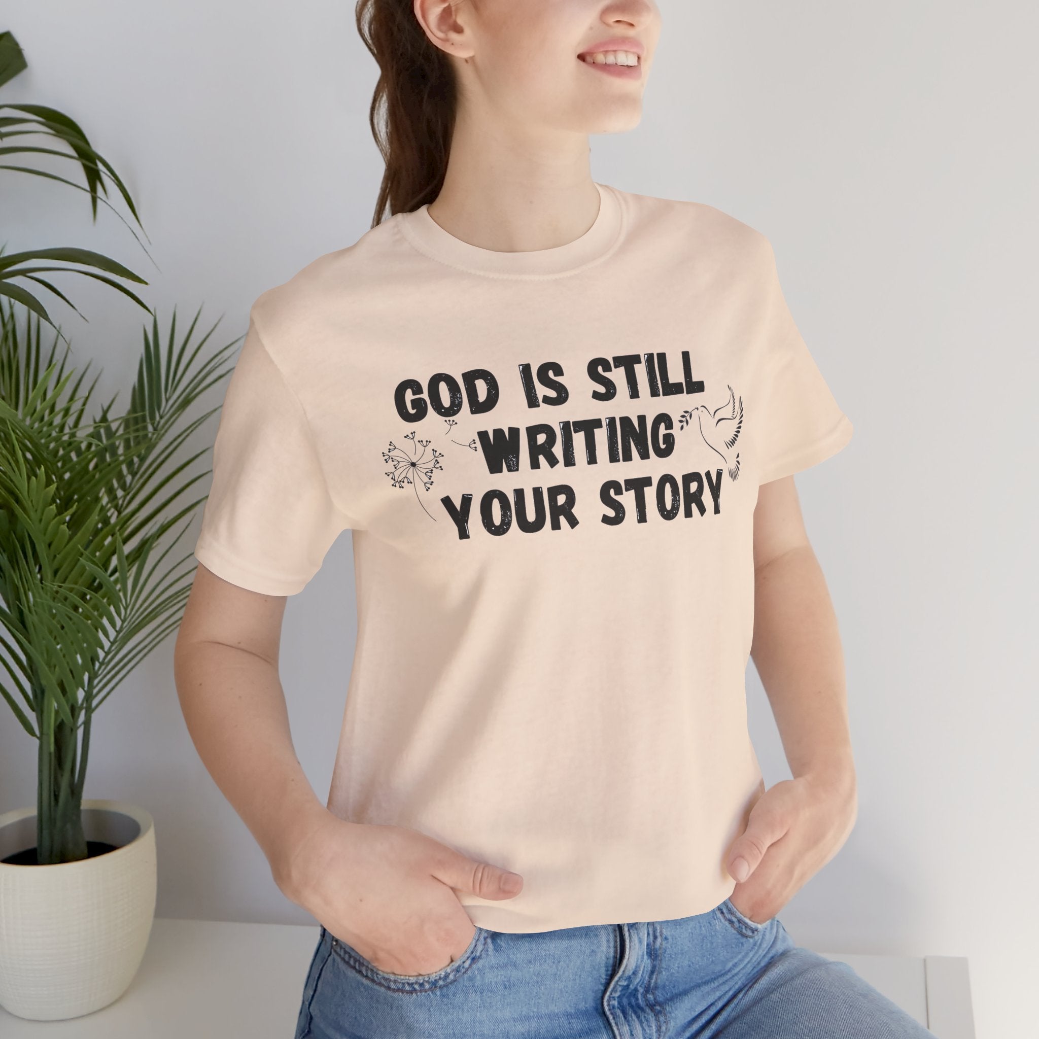 Christian Inspirational Tee - "God Is Still Writing Your Story" Graphic Shirt