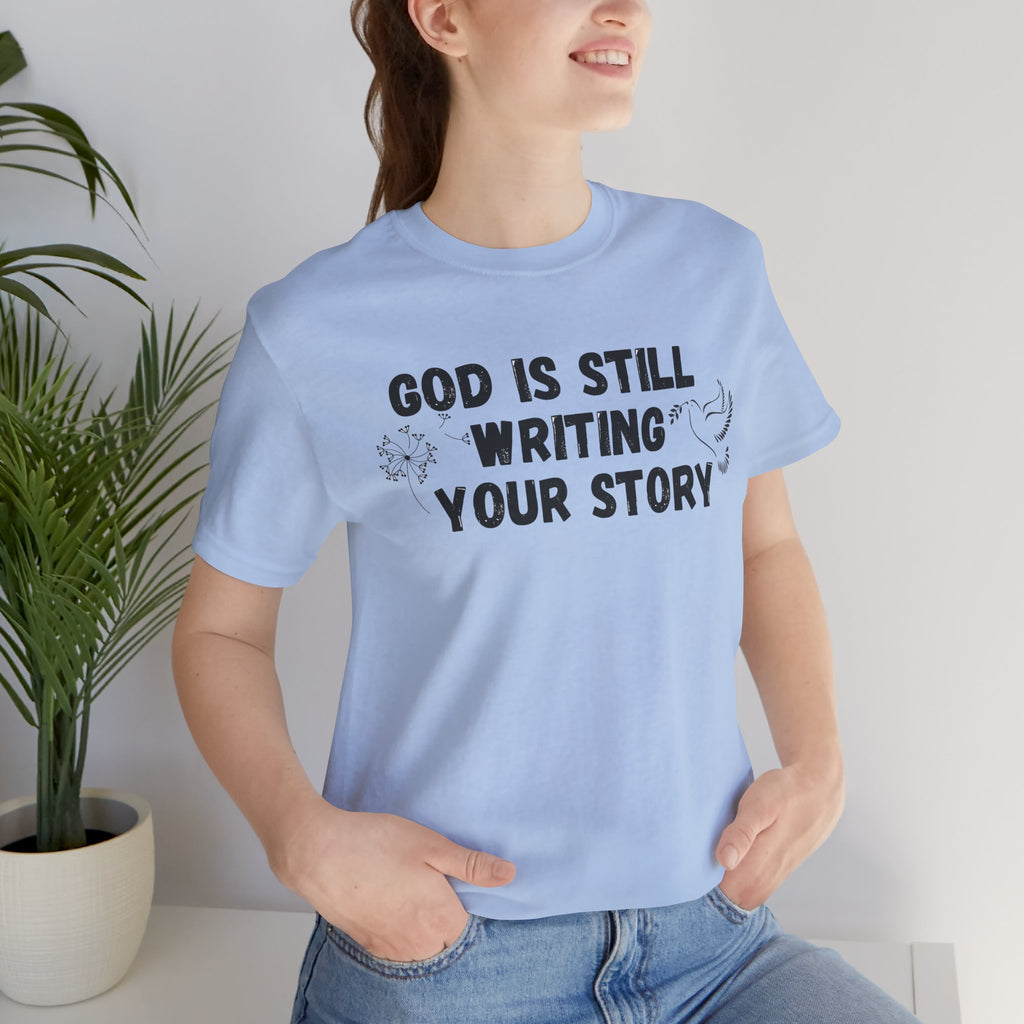 Christian Inspirational Tee - "God Is Still Writing Your Story" Graphic Shirt